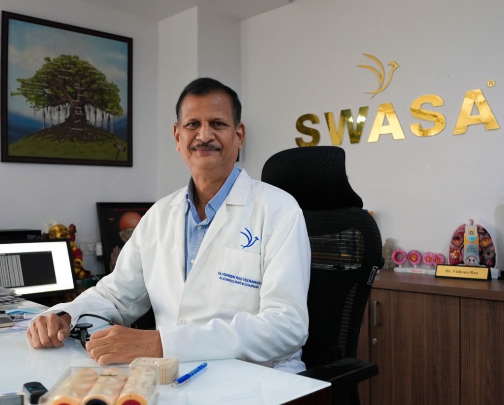 Dr. Vishnun Rao Veerapaneni at his office with SWASA branding