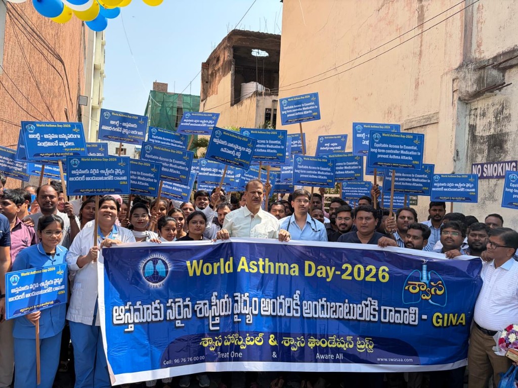 World Asthma Day 2026 street rally with large blue banner and placards